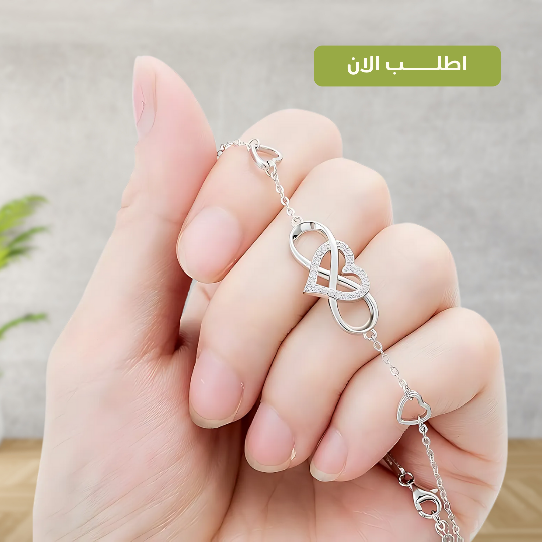 أسورة من الفضة الإسترليني عيار 925 بتصميم إنفينيتي أنيق، يزينه قلب مرصع بزيركون أصلي فاخر - كود 5404