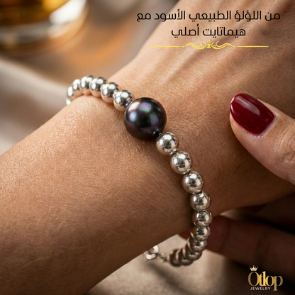 اسورة من حجر الهيماتايت الطبيعي ، مع لؤلؤة طبيعية سوداء في المنتصف ،  للرجال ، للنساء،  هدية قيمة - كود 1800