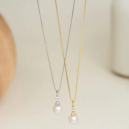 سلسله من الفضه عيار 925 المطليه بالذهب مع دلايه من اللؤلؤ الحر - كود 412