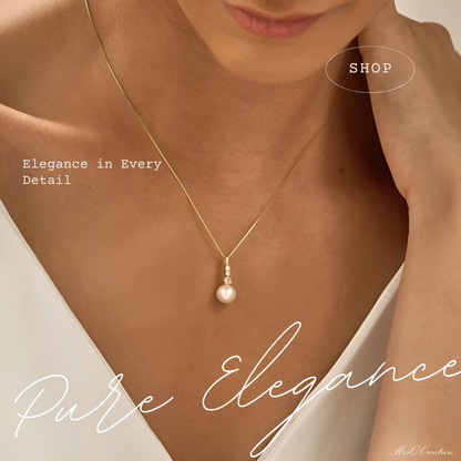 سلسله من الفضه عيار 925 المطليه بالذهب مع دلايه من اللؤلؤ الحر - كود 412