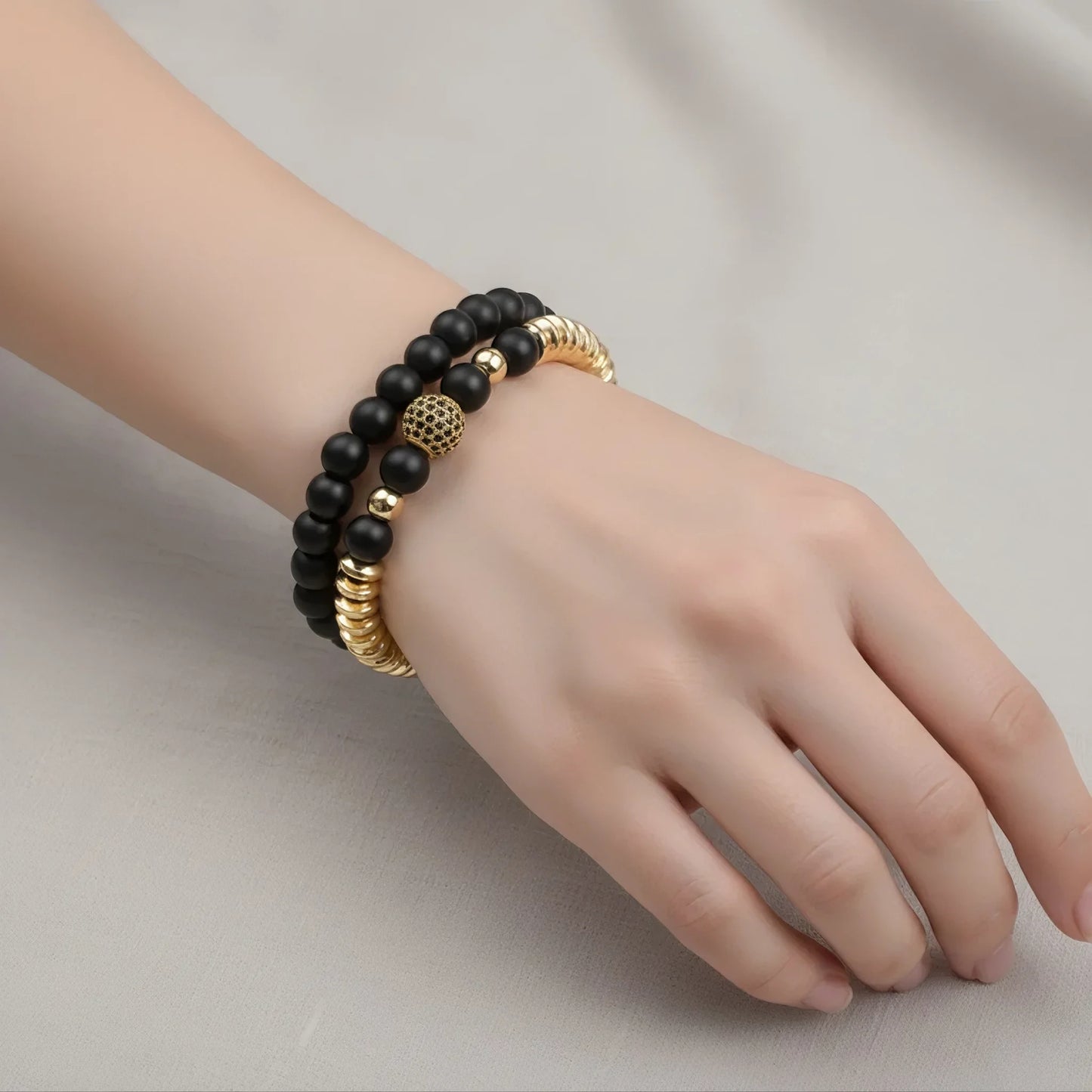 اسورتين من الحجر الكريم الأوبسيديان مع الزيركون والهيماتيت - كود 4700